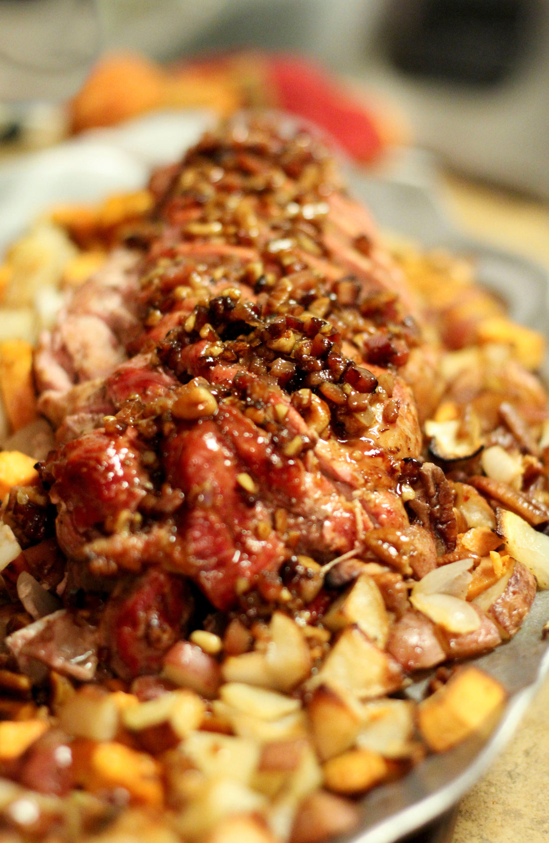 HEAVENLY PECAN PORK OVER SWEET POTATO HASH